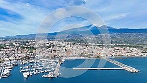 Riposto -  vista aerea dall'alto sul porto della cittÃÂ  durante giornata di sole con Etna sullo sfondo photo